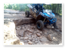 A sxs going down a steep incline on the buckhorn trail system
